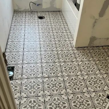 patterned tile flooring in bathroom